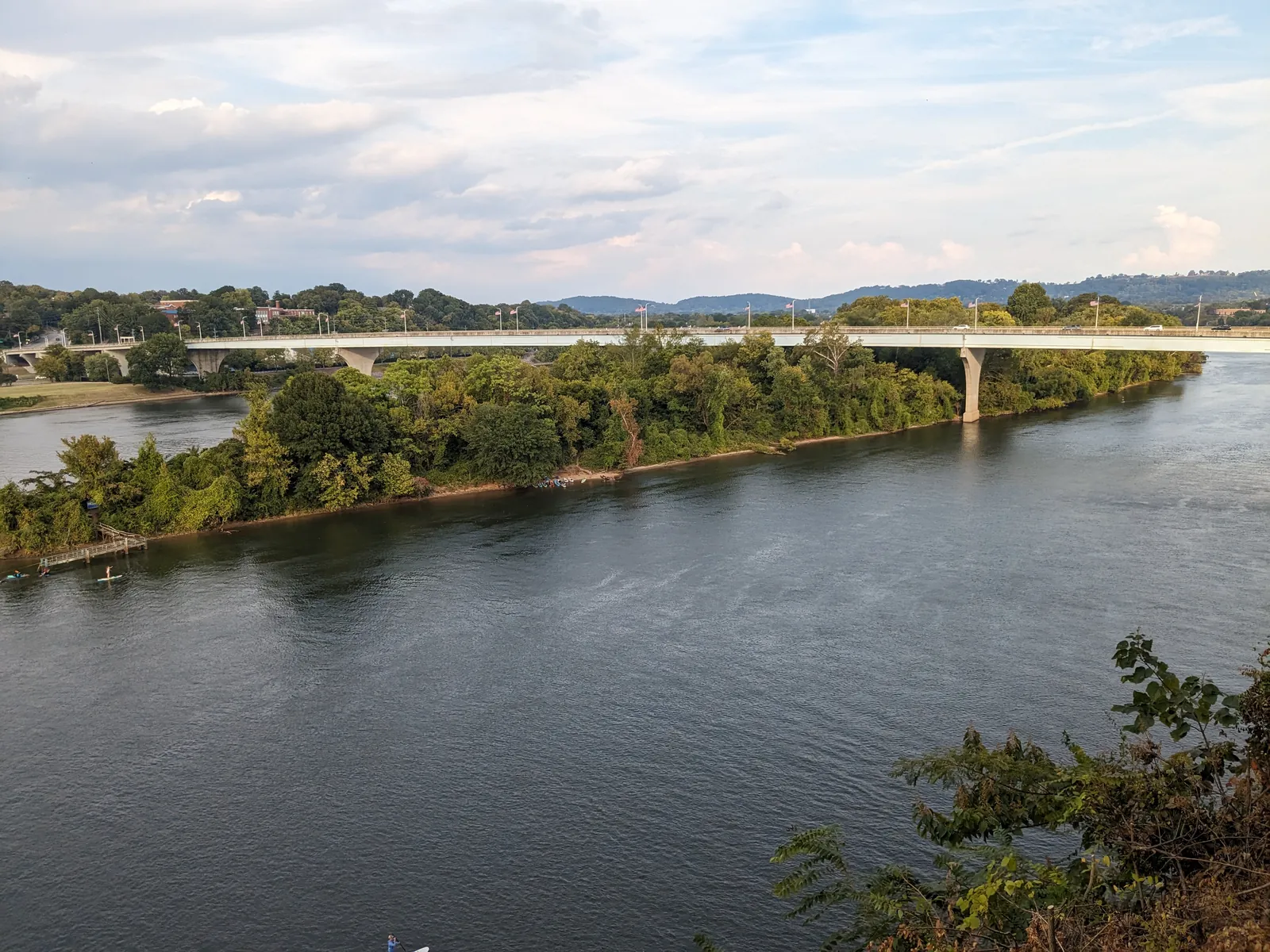 The Tennessee River flowing past Maclellan Island and the Veterans Memorial Bridge in Chattanooga, seen from the bluff downtown